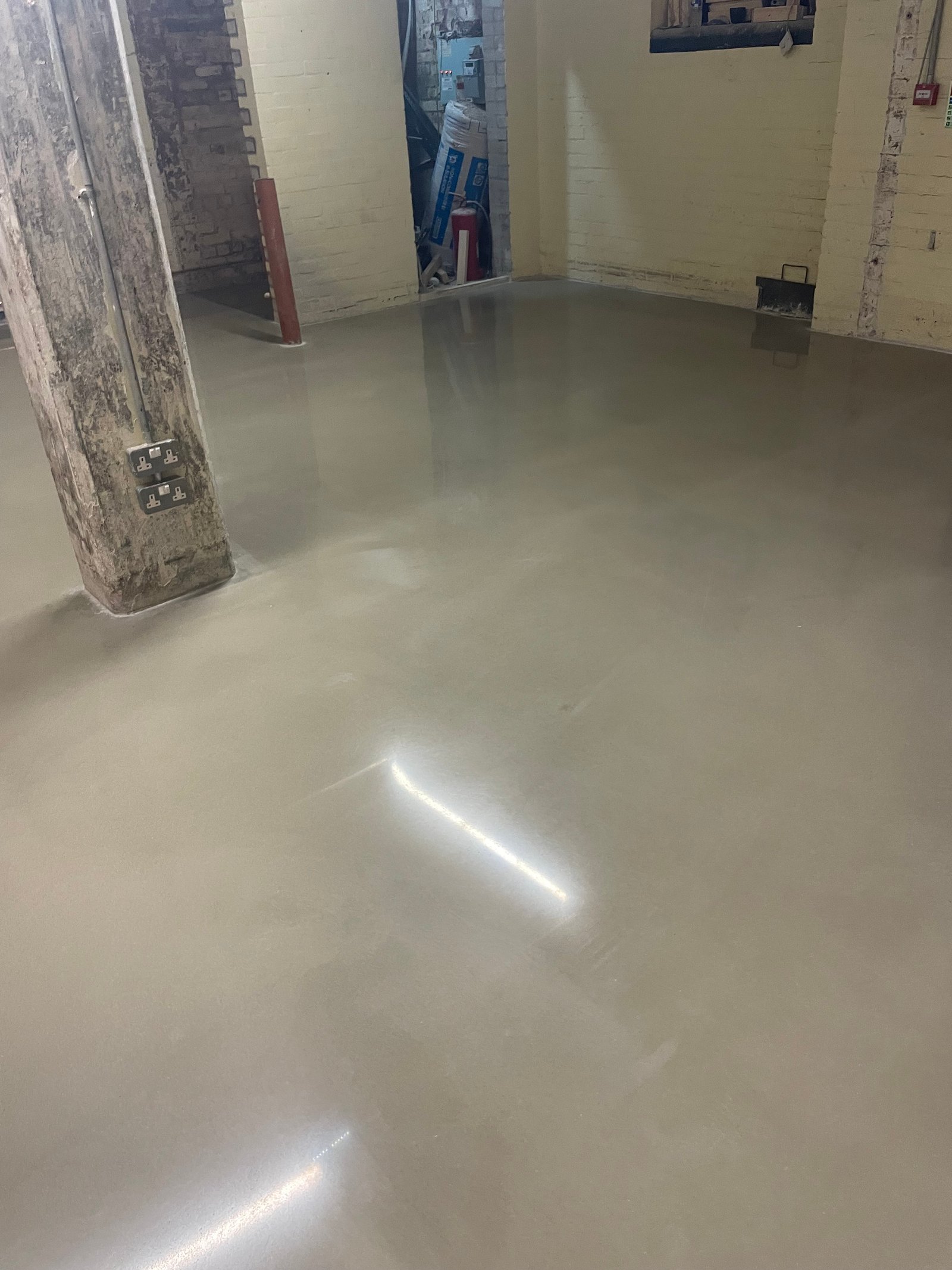 Polished concrete overlay in rear extension with rooflight