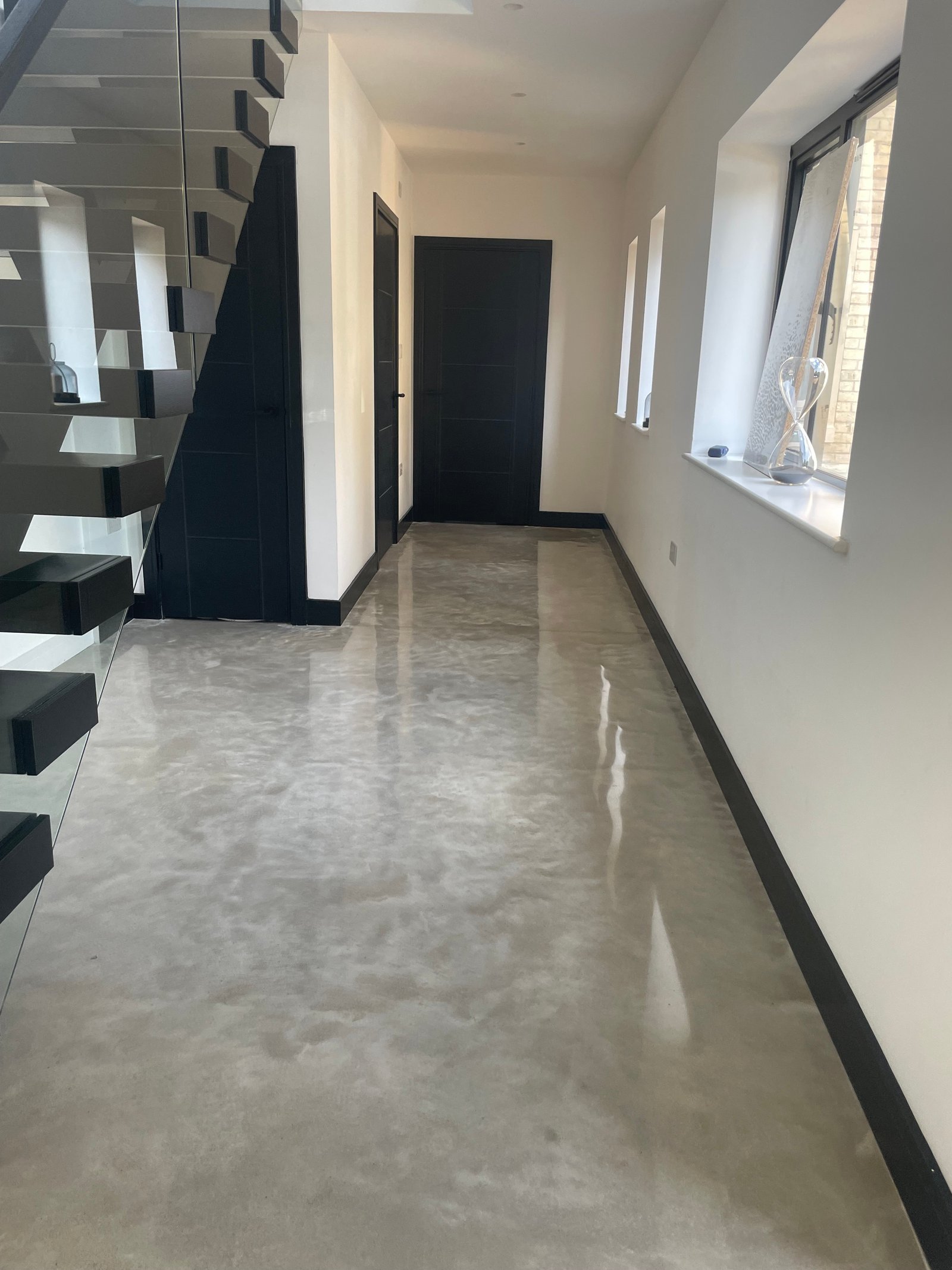Polished concrete hallway floor in residential home