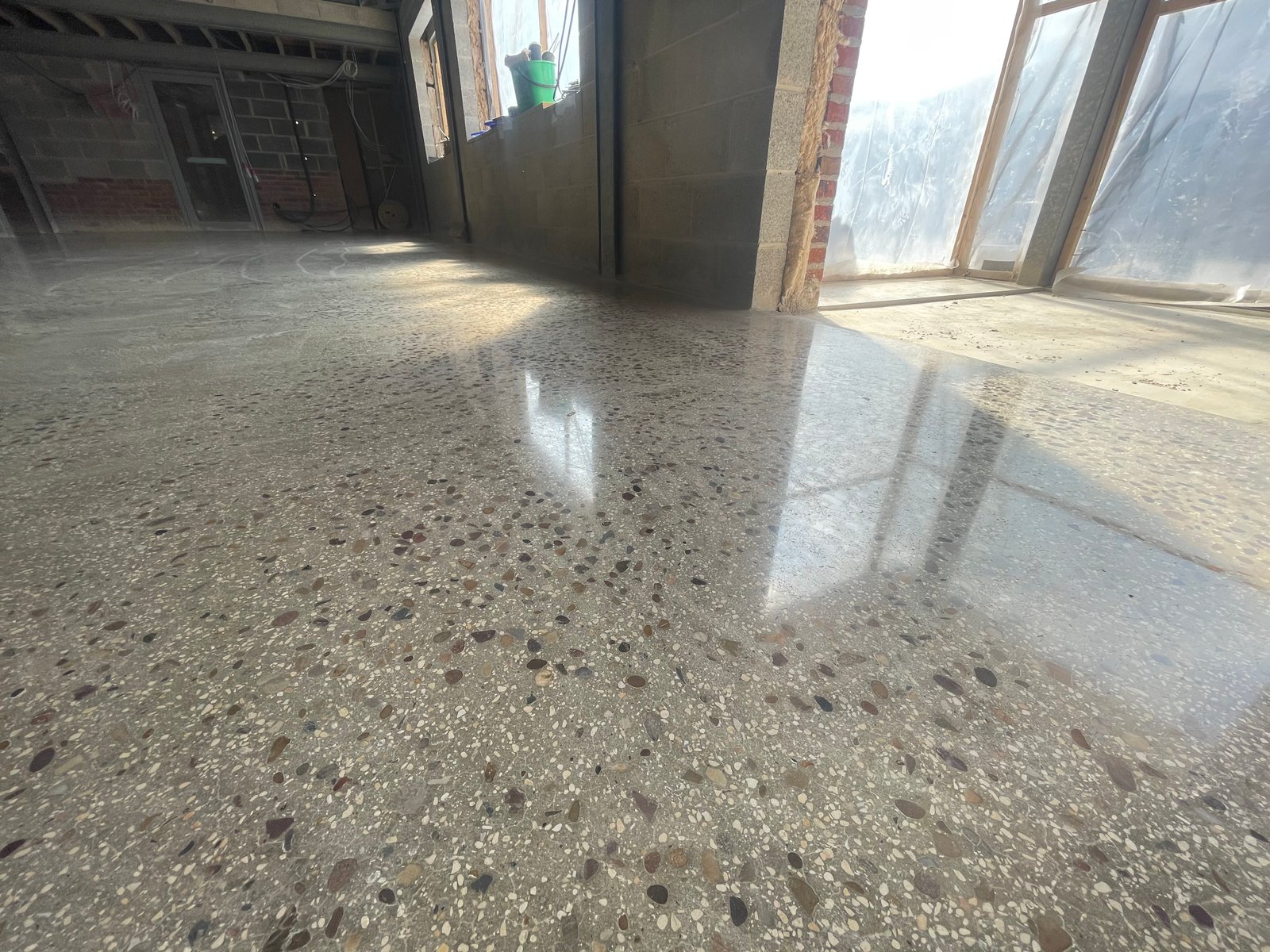 Concrete overlay salt and pepper finish